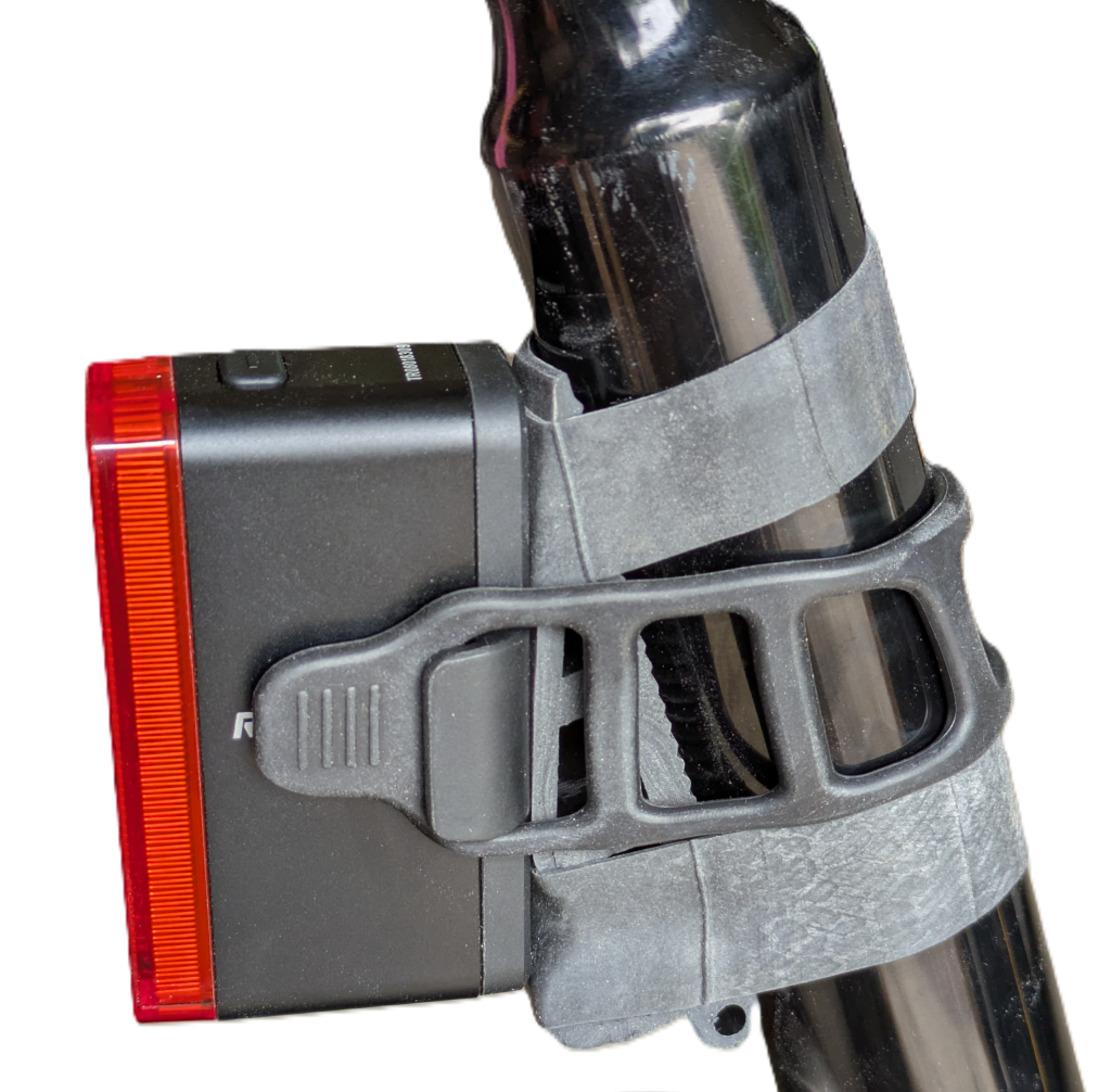 Attaching a rear bicycle light to an angled seat post