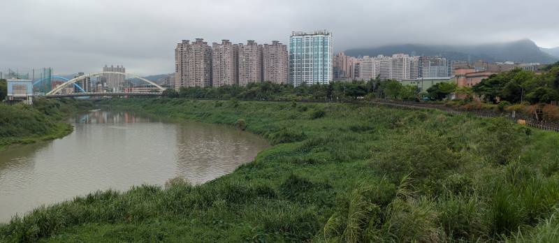 Cycle path along Keelung river, Taipei. The cycle path is runs across the photo. 16 Apr 2026.